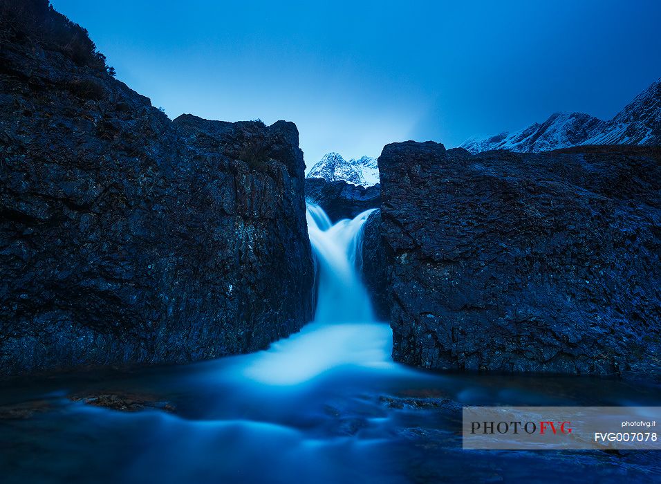 Glen Brittle, Fairy Pools.
This Picture was taken during the blue hours. The Mountains in the middle pretend to be the white point in the blue mood