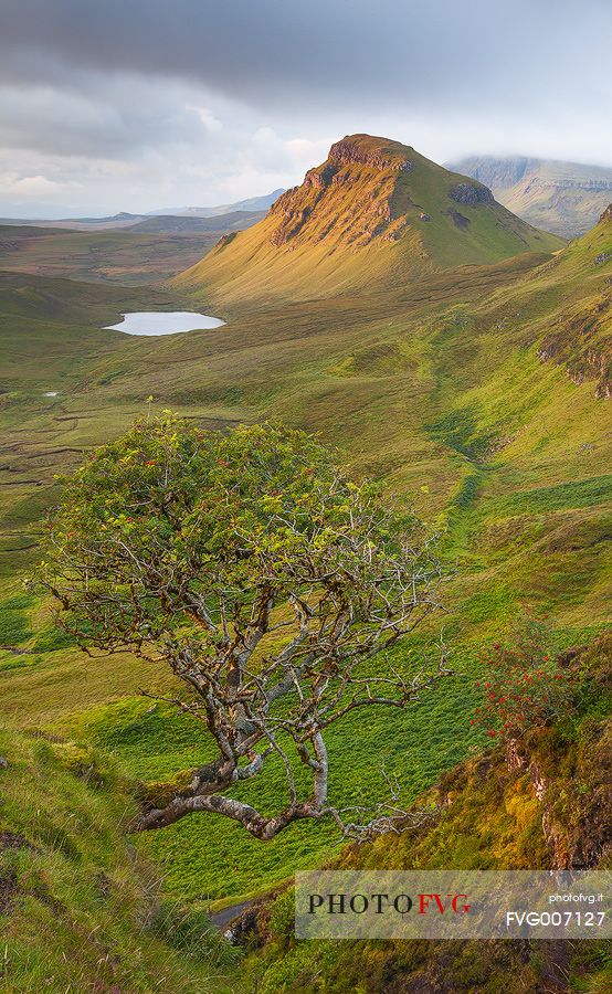 A warm ray of light reach the Quiraing during a quite sunrise