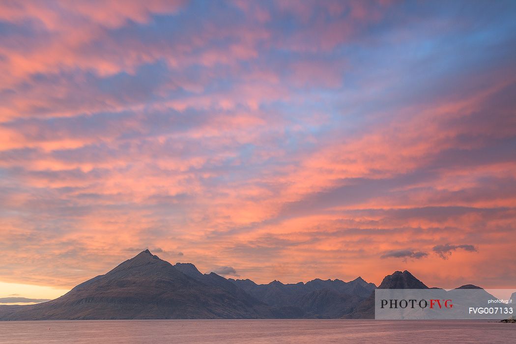 A super afterglow with an impressive display of colors above the Cuillin Hills, from Elgol Beach