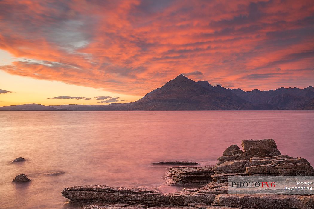 A super afterglow with an impressive display of colors above the Cuillin Hills, from Elgol Beach