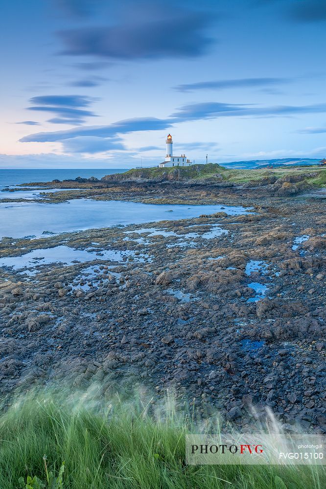 The view of the lighthouse from above during a windy day. This picture has been taken few minutes after the sunset