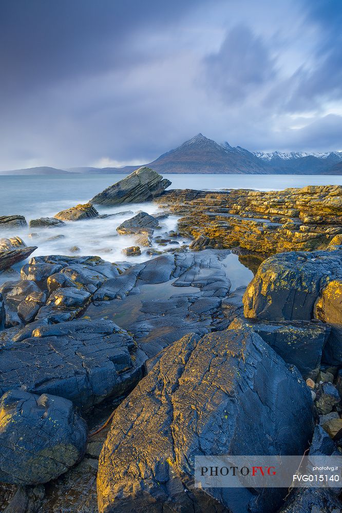 The warm light of late afternoon on the rocks. Just before the rain storm was coming