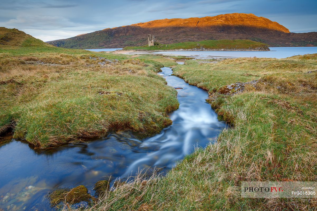 A picture of Ardvreck Castle at sunrise