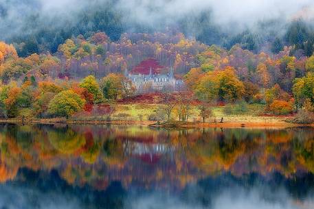 Tigh Mor hotel surrounded by fog in autumn in the Trossachs Tigh Mor hotel surrounded by fog in autumn in the Trossachs