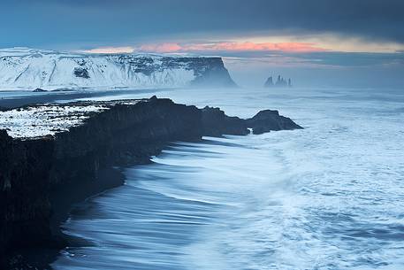 This image was taken from above a cliff and portraits the southern Icelandic coast during a windy day.