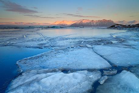 Jokulsarlon lagoon during the first light of sunrise. .