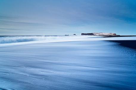 A blue sunrise on the beach at Vik