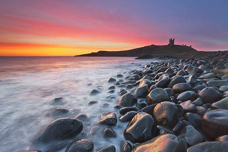 Sunrise at Dunstanburgh Beach