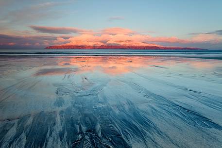 The First Light kisses Rum Mountaing on the background