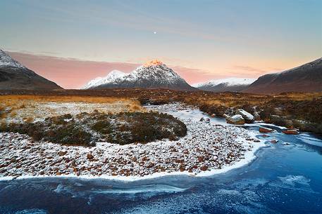 Beautiful sunrise in front of Buachaille Etive Mor the most iconic mountains of Scotlands
