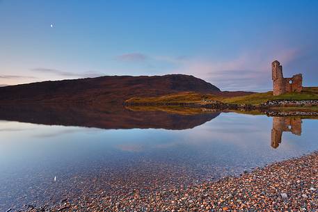 Standing on a rocky promontory jutting out into Loch Assynt in Sutherland, north west Highland, Scotland, Ardvreck Castle is a ruined castle dating from the 16th century