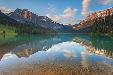 Reflections into the Emerald Lake water at late Afternoon