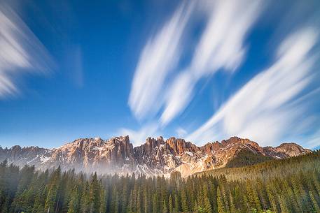 The Beauty of Dolomites captured from Carezza Lake at dusk The Beauty of Dolomites captured from Carezza Lake at dusk