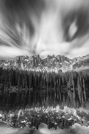 The Beauty of Dolomites captured from Carezza Lake at dusk The Beauty of Dolomites captured from Carezza Lake at dusk