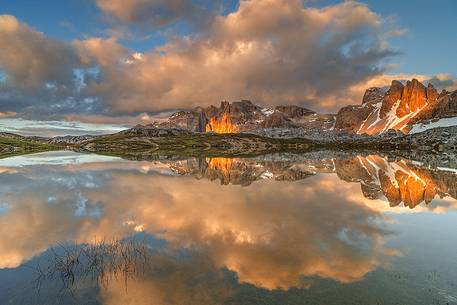 The red light of a splendid sunset hits Mount Paterno which is reflected in the Piani Lake The red light of a splendid sunset hits Mount Paterno which is reflected in the Piani Lake