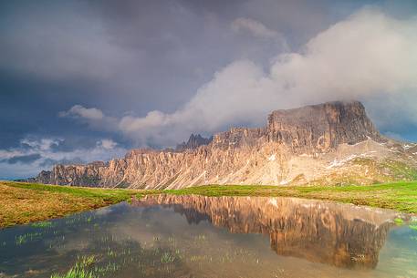 Lastoni of Formin reflected in a puddle Giau