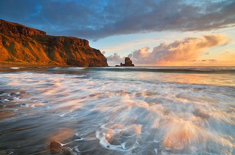 Amazing sunset colours and light reflection on the waves at Talisker Bay
