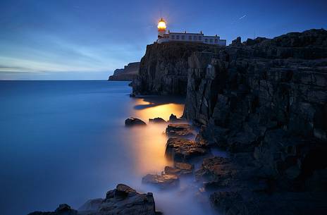 Star trail above the lighthouse of Neist Point just after the afterglow time