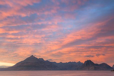 A super afterglow with an impressive display of colors above the Cuillin Hills, from Elgol Beach