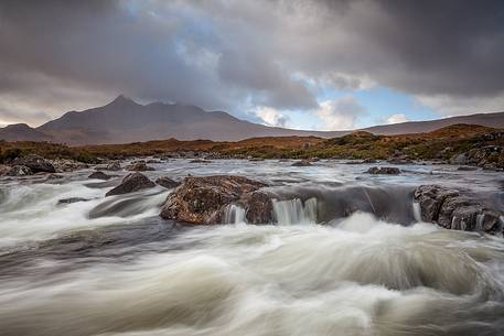 The incoming storm is starting to bring the rain over the black cuillin and provide to the landscape a very dramatic mood The incoming storm is starting to bring the rain over the black cuillin and provide to the landscape a very dramatic mood