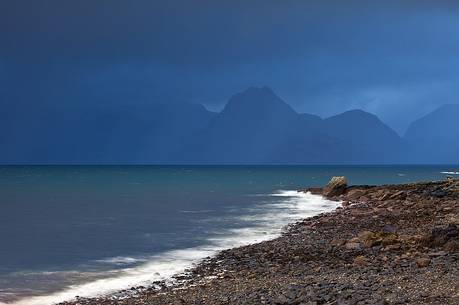 Dramatic sky above the Cuillin Hills during a stormy day Dramatic sky above the Cuillin Hills during a stormy day