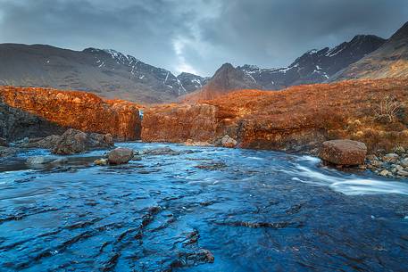 After months of rain the streams at Glen Brittle are powerful than ever. The waterfalls in all its glory and the last light of the day enhances the landscape of beauty