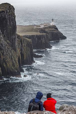 Two hikers at Neist Point, United Kingdom, UK, Scotland, Inner Hebrides , Isle of Skye 