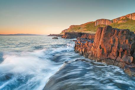 First ray of light at Staffin Bay, Isle of Skye, Scotland, UK