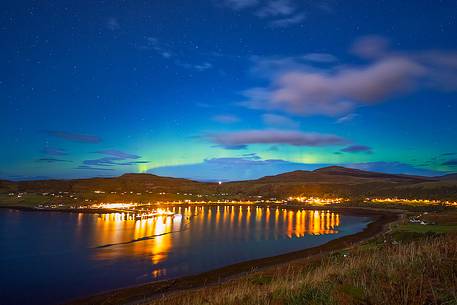 A very special and rare moment at Uig. The Aurora Borealis shows up in the sky, above the Uig Harbour