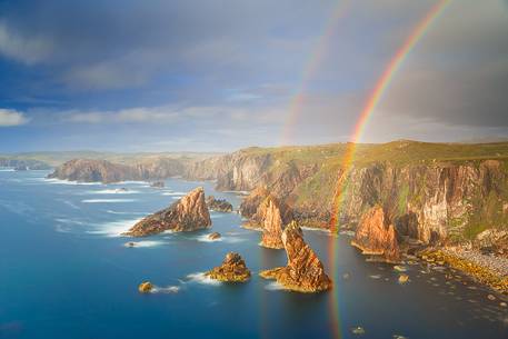 An incredible double rainbow shows up after a variable weather day