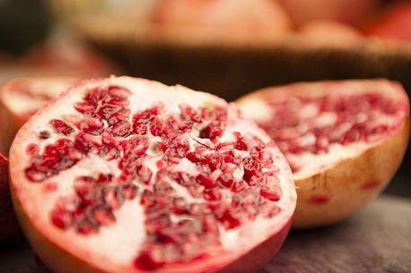 Close up of pomegranates on market stand, Jerusalem, Israel
