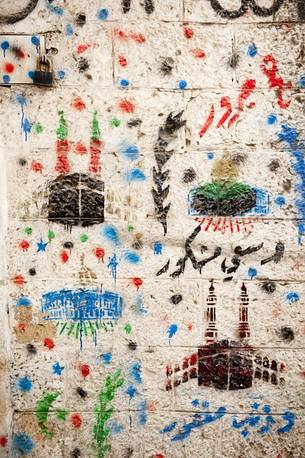 Designs glorifying the pilgrimage to Mecca on the walls of Jerusalem, Israel Designs glorifying the pilgrimage to Mecca on the walls of Jerusalem, Israel