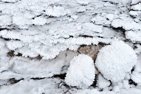 the ice created patterns on the bed of the river