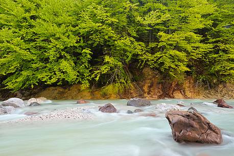 The crystal clear waters of thaw down to the valley