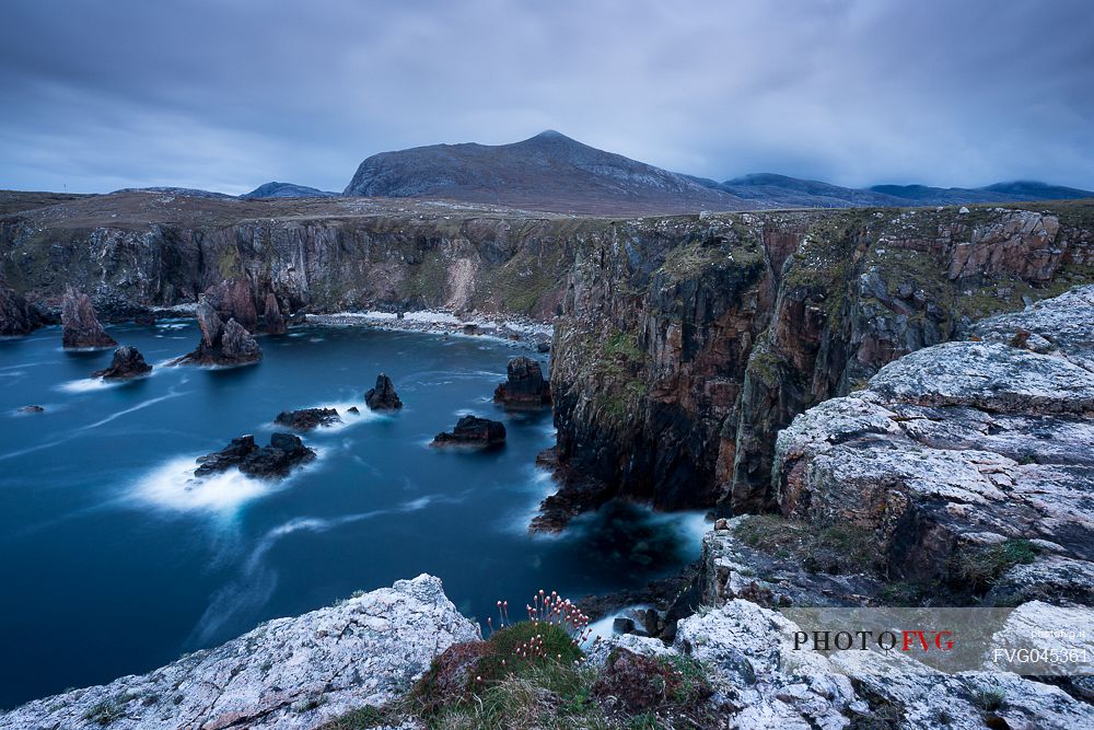 Sea stacks near Mangersta on the Outer Hebrides at twilight, Isle of Harris, Scotland, United kingdom