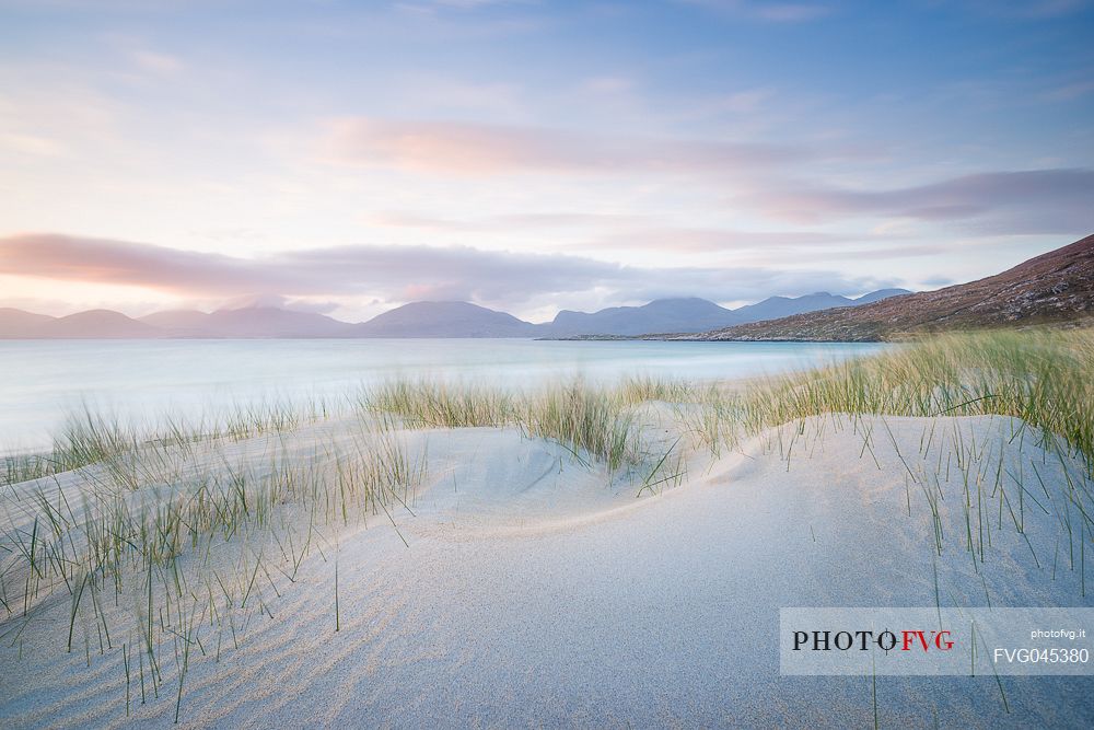 Sunset on Luskentyre beach in the Outer Hebrides on the Isle of Harris, Scotland.