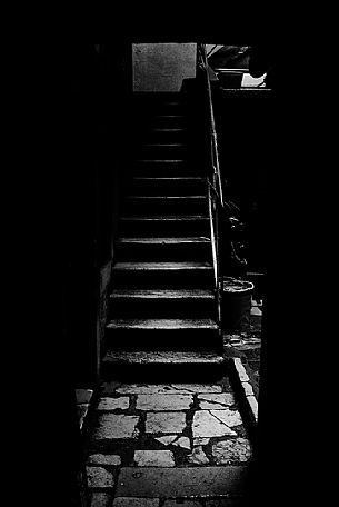 Stair in a dark alley of Venice, Italy