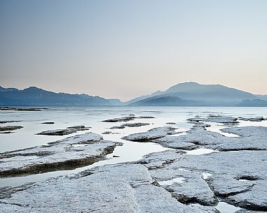 Garda lake at twilight from Sirmione, in the background the Monte Baldo mount, Brescia, Lombardy, Italy, Europe