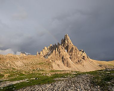 The magic light of sunset warms the Mount Paterno after a storm in a summer evening, Tre Cime natural park, dolomites, Trentino Alto Adige, Italy, Europe The magic light of sunset warms the Mount Paterno after a storm in a summer evening, Tre Cime natural park, dolomites, Trentino Alto Adige, Italy, Europe