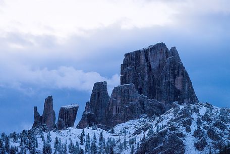 The light before dawn toward the snowy Cinque Torri peak from Falzarego pass, Cortina d'Ampezzo, dolomites, Veneto, Italy, Europe