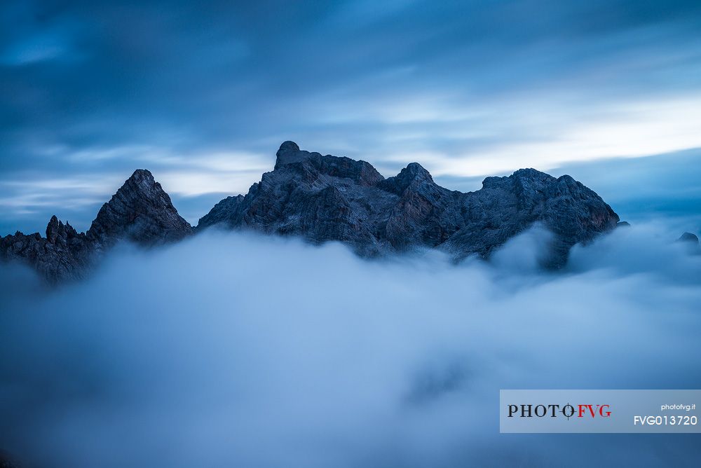 The peaks are escaping the clouds.