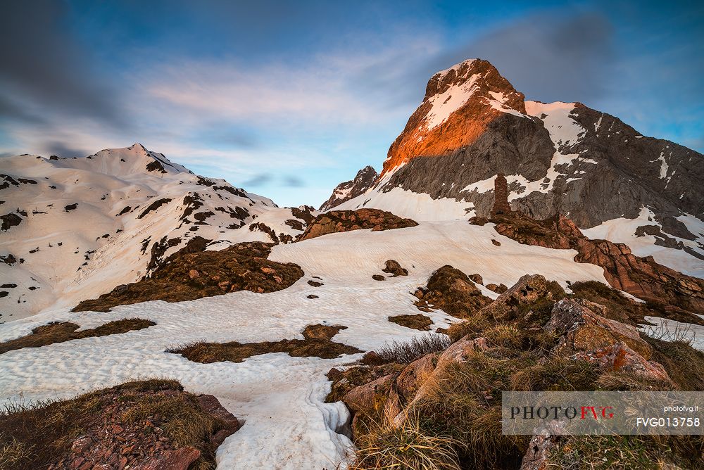 Mt. Coglians illuminated on sunset.