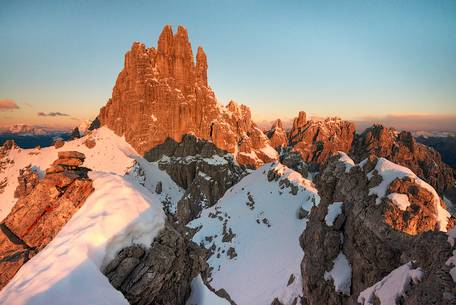 Morning red lights on Monfalconi di Forni mountai chain