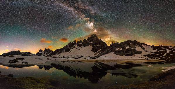 Milky way reflects on the lake under Mt. Paterno.