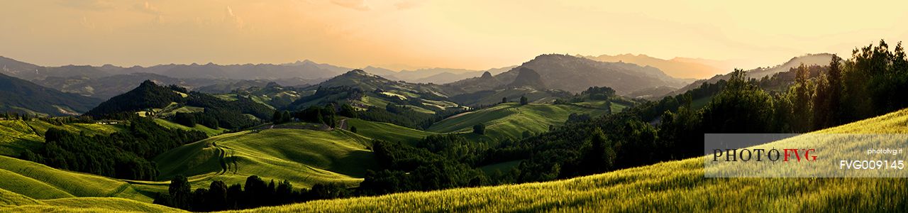 sunrise over the Crete Senesi in a misty morning