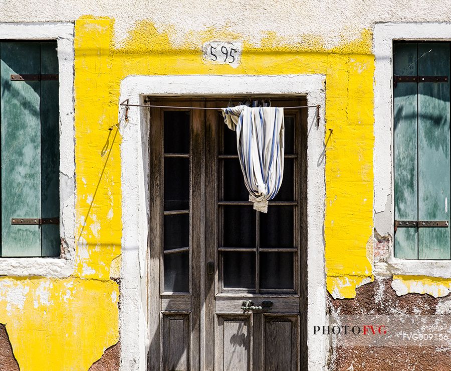 urban colorfull architecture or Burano near Venice, new and old house create a magic atmosphere