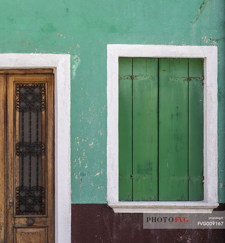 urban colorfull architecture or Burano near Venice, new and old house create a magic atmosphere