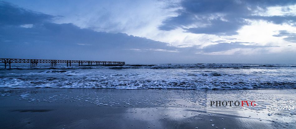 sunrise at Cervia pier