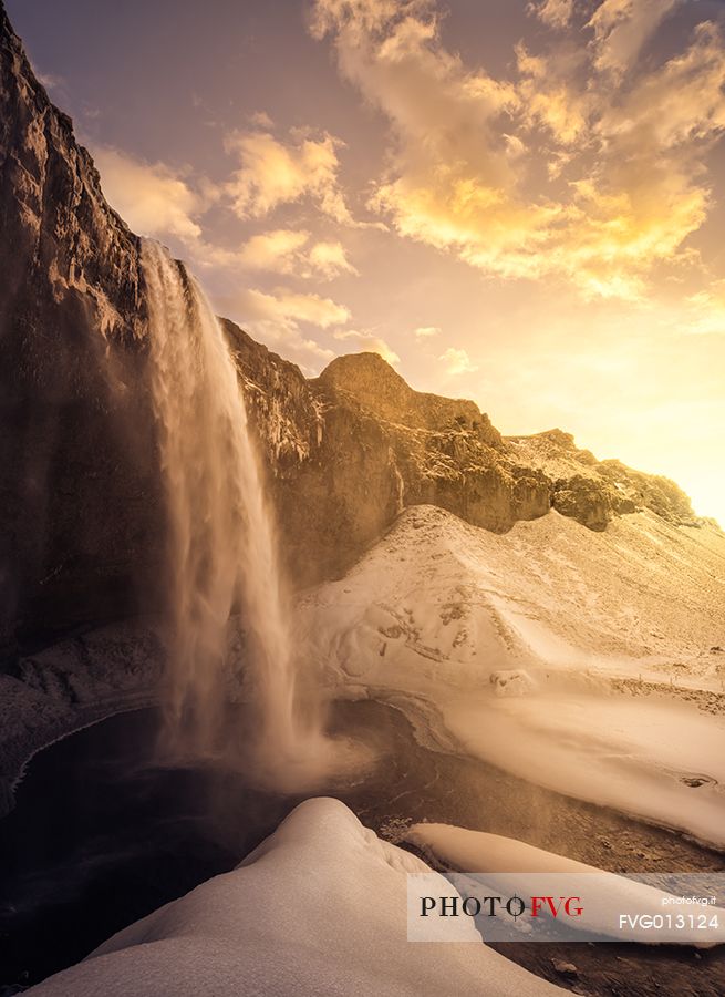 Kirkjufell mountain with water falls at winter, Iceland