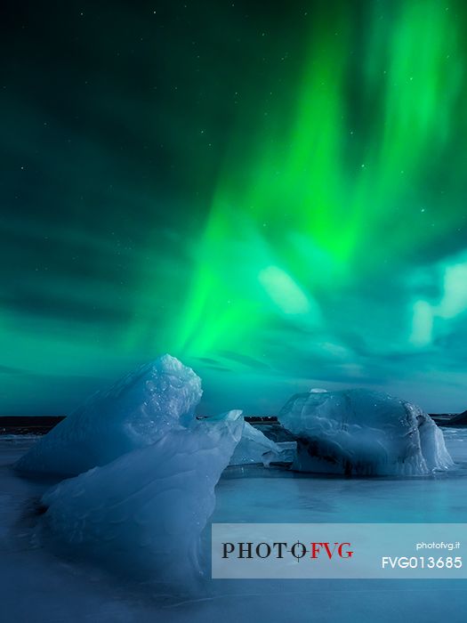 Aurora borealis over ice laggon